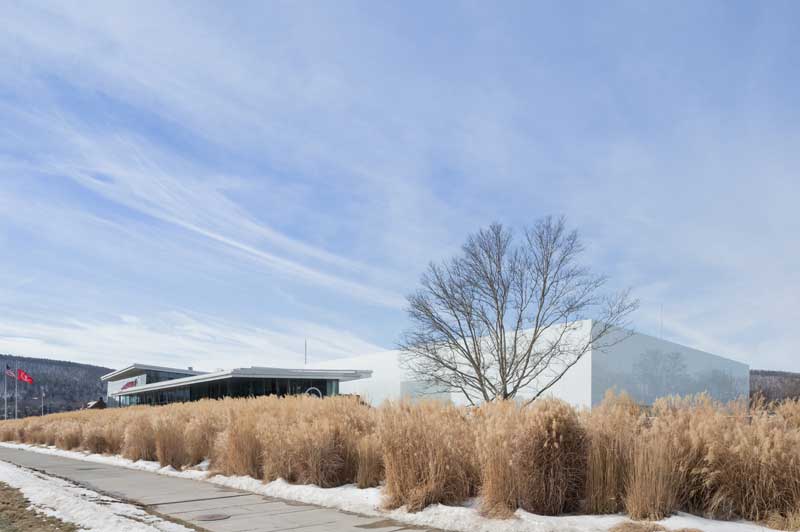 The front of the Corning Museum of Glass, featuring the new Contemporary Art + Design Wing, designed by Thomas Phifer and Associates.