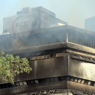 Smoke rises from The National Museum of Natural History in New Delhi on April 26, 2016, after an early morning fire was controlled. No casualties were reported, but the entire collection may have been lost.