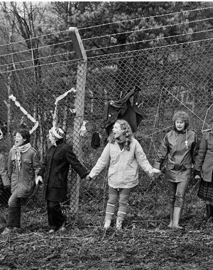 'Embrace the Base’: 30,000 women link hands, completely surrounding the nine mile perimeter fence at RAF/USAF Greenham Common, Berkshire (1982), Edward Barber.