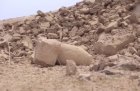 Screenshot from ISIS video showing the destroyed 'mermen' statues of the seven sages at the Fish Gate, Temple of Nabu, Nimrud, Iraq