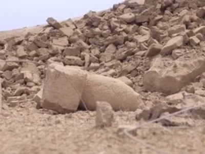Screenshot from ISIS video showing the destroyed 'mermen' statues of the seven sages at the Fish Gate, Temple of Nabu, Nimrud, Iraq