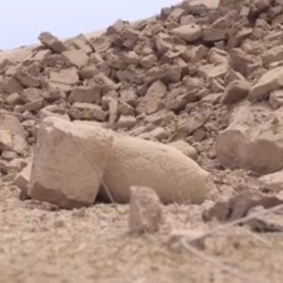 Screenshot from ISIS video showing the destroyed 'mermen' statues of the seven sages at the Fish Gate, Temple of Nabu, Nimrud, Iraq