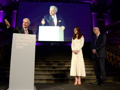 Martin Roth, director of the Victorian and Albert Museum, accepts the Art Fund's Museum of the Year Award 2016 from the Duchess of Cambridge, during a ceremony at the Natural History Museum, London.