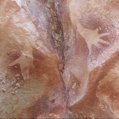 Hand stencils with mutilated little finger at the Djulirri rock art site in the Wellington Range of Arnhem Land, Northern Territory, Australia.