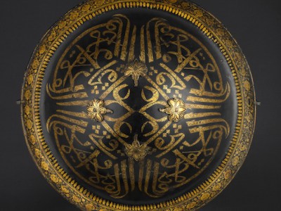 Lacquered hide shield (dhal), second half of the 18th century, India, probably Mysore, buffalo hide, gold and velvet, diam. 45cm. Peter Finer (£200,000)
