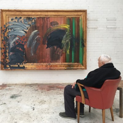 Portrait of Howard Hodgkin featuring Portrait of the Artist Listening to Music (2016), photographed by Miriam Perez. Courtesy Gagosian.