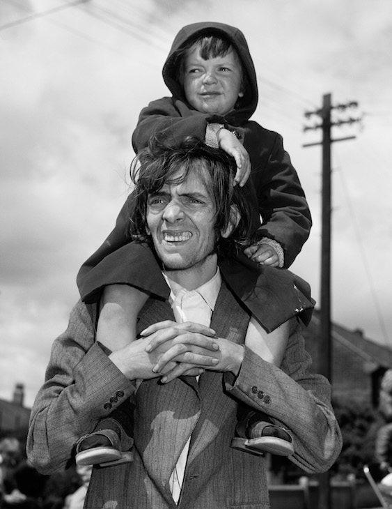 Father and Son Watching a Parade, West End, Newcastle (1980; negative); (1986; print), Chris Killip. J. Paul Getty Museum, Los Angeles. Courtesy the artist