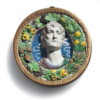 A polychrome glazed terracotta bust of a laureate in a frame of fruit, vegetables and pine cones (c. 1487–94), Andrea della Robbia
