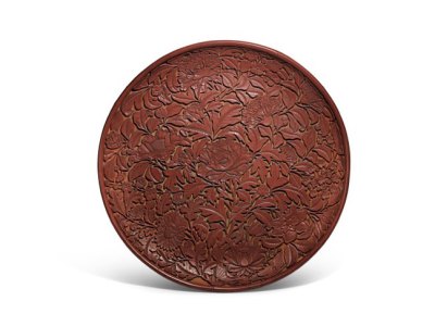 Carved cinnabar lacquer dish (Lat Yuan/early Ming dynasty), China. Sotheby's.