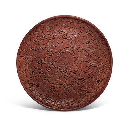 Carved cinnabar lacquer dish (Lat Yuan/early Ming dynasty), China. Sotheby's.