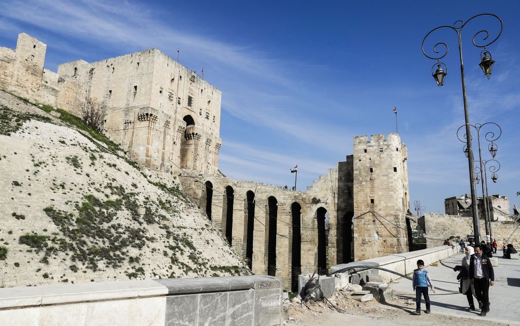 The double entrance gateway to the Aleppo Citadel, largely the work of the late 12th century Ayyubid rulers of Aleppo (pictured here on 9 March, 2017) has largely survived the conflict with only minor damage. Photo: JOSEPH EID/AFP/Getty Images