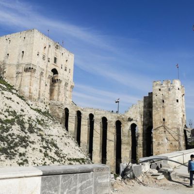 The double entrance gateway to the Aleppo Citadel, largely the work of the late 12th century Ayyubid rulers of Aleppo (pictured here on 9 March, 2017) has largely survived the conflict with only minor damage. Photo: JOSEPH EID/AFP/Getty Images