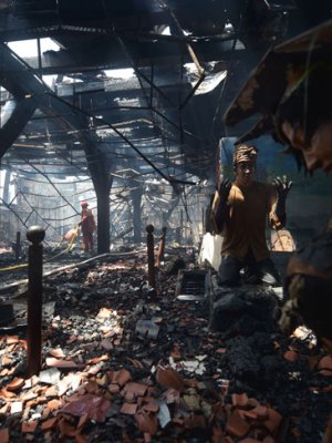 Indonesian firefighters working to extinguish a fire inside the 17th-century Dutch colonial building maritime museum in Jakarta on 16 January 2018.