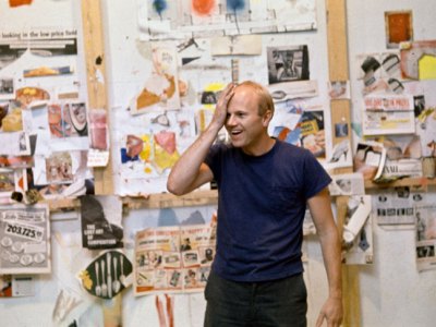 James Rosenquist in his studio with source materials, 1966