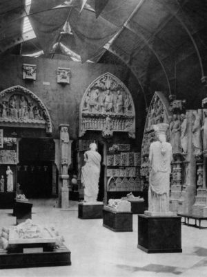 The Erechtheion caryatid, purchased from the British Museum and displayed in the 12th-century gallery of the Trocadéro, adjacent to the smiling angel from Reims Cathedral. From P. F. J. Marcou, Album du Musée de Sculpture Comparée, vol. 2 (Paris, 1897), courtesy Princeton University Press