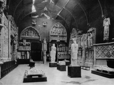 The Erechtheion caryatid, purchased from the British Museum and displayed in the 12th-century gallery of the Trocadéro, adjacent to the smiling angel from Reims Cathedral. From P. F. J. Marcou, Album du Musée de Sculpture Comparée, vol. 2 (Paris, 1897), courtesy Princeton University Press