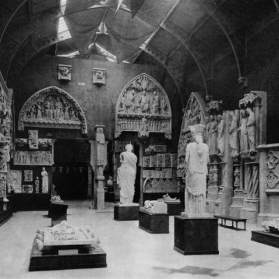 The Erechtheion caryatid, purchased from the British Museum and displayed in the 12th-century gallery of the Trocadéro, adjacent to the smiling angel from Reims Cathedral. From P. F. J. Marcou, Album du Musée de Sculpture Comparée, vol. 2 (Paris, 1897), courtesy Princeton University Press