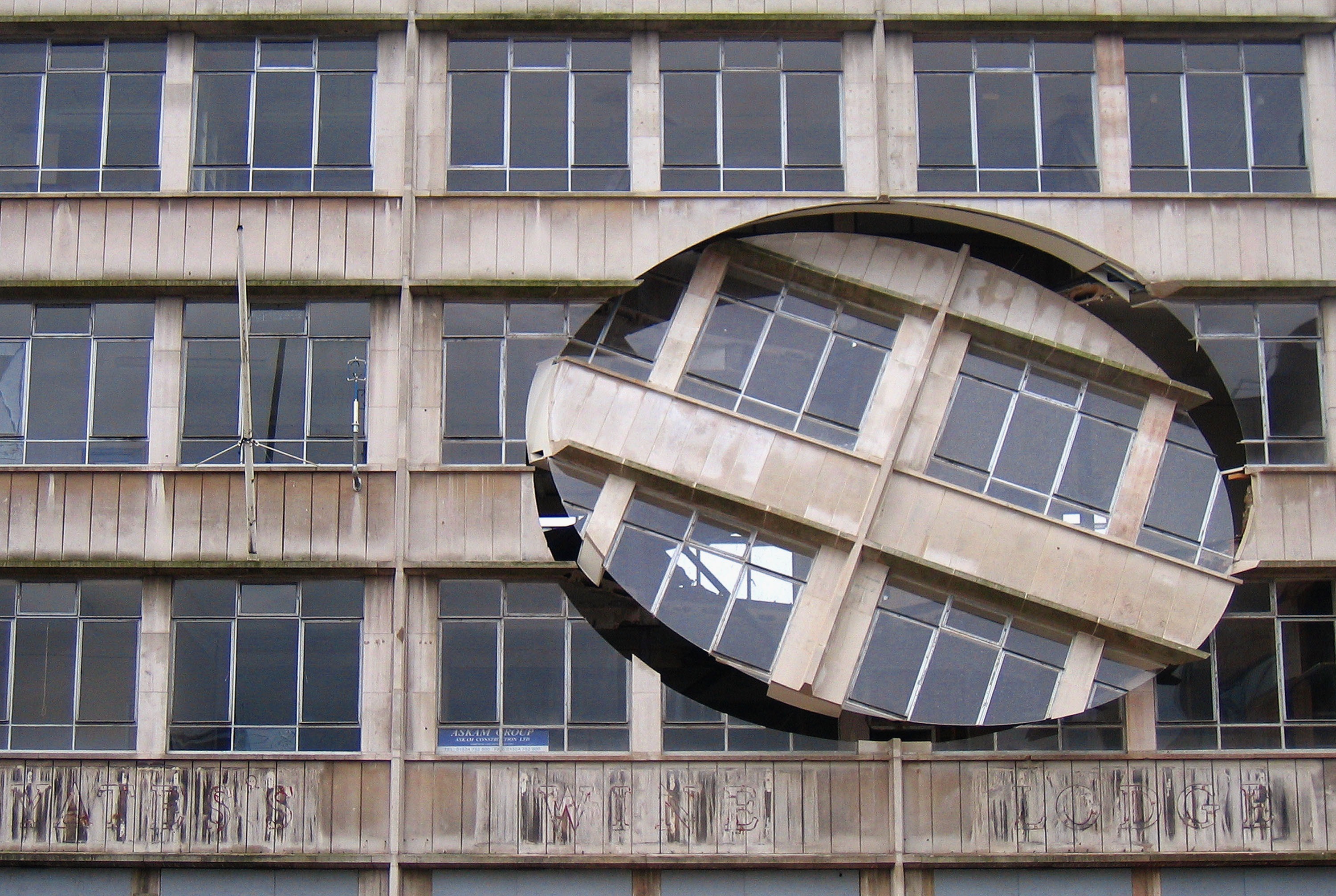 Turning The Place Over (2007), Richard Wilson. The work was built into the condemned Cross Keys House in Moorfields as part of the Capital of Culture for 2008, in June 2007 in Liverpool, England.