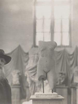 Auguste Rodin photographed in his Museum of Antiquities, c. 1908–12, by Albert Harlingue, courtesy British Museum, London