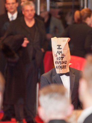 Shia LaBeouf wearing a paper bag on his head at the premiere of the film ‘Nymphomaniac (I)’