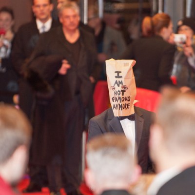 Shia LaBeouf wearing a paper bag on his head at the premiere of the film ‘Nymphomaniac (I)’