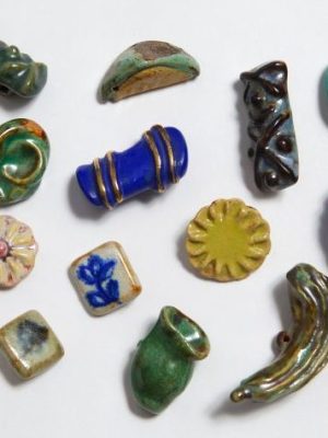 A selection of glazed ceramic buttons (1944–45), Lucie Rie.