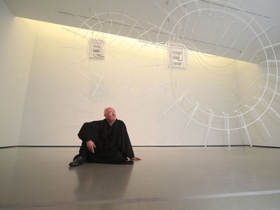 Cerith Wyn Evans in front of his work Composition for 37 flutes (in two parts), 2018; Photo: © Danny Lawson/PA Wire