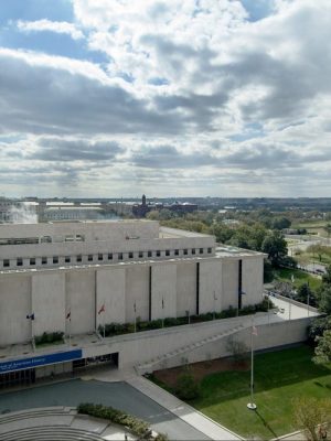 The Smithsonian's National Museum of American History, Kenneth E. Behring Center in Washington, D.C., with the Washington Monument and National Mall in the background.