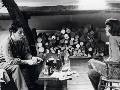 Jean-Paul Riopelle and Joan Mitchell photographed in their apartment-studio on Rue Frémicourt, Paris in 1963.