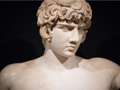 Bust of Antinous with Greek inscription, (AD 130–138), discovered in Balanea, Syria in 1879. Private collection