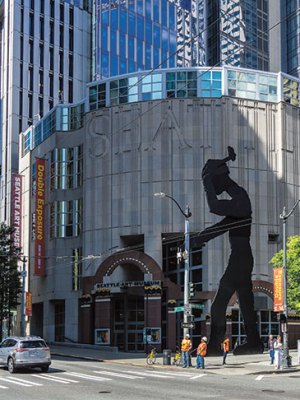 Seattle Art Museum, with Hammering Man (1991) by Jonathan Borofsky at its entrance.