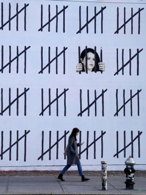 A Banksy mural unveiled in New York in March 2018 to raise awareness of the imprisonment of Zehra Doğan.