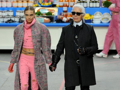 Karl Lagerfeld with Cara Delevingne during the Chanel show at Paris Fashion Week, 2014.