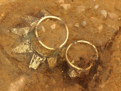 Drinking vessels with decorated gold neck in-situ.