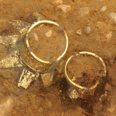 Drinking vessels with decorated gold neck in-situ.