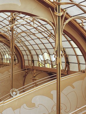 Stained-glass skylight and mirror at the top of the Maison & Atelier Horta.
