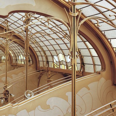 Stained-glass skylight and mirror at the top of the Maison & Atelier Horta.