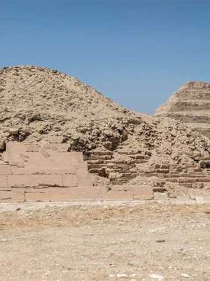 The pyramids in the Saqqara necropolis, with the Pyramid of Unas in the foreground and the Step Pyramid of Djoser in the background.