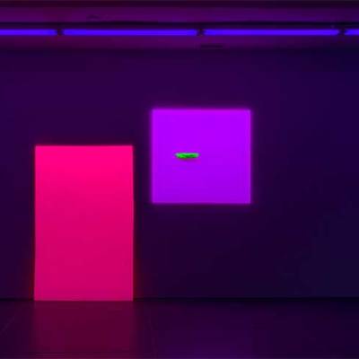 Installation view of ‘Jacqueline Humphries’ at the Dan Flavin Art Institute, Bridgehampton, New York. On the right hangs Painting (2019).
