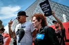 Nan Goldin at a P.A.I.N. protest in front of the Louvre in July 2019.