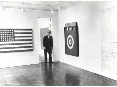 Leo Castelli in a room of the Jasper Johns exhibit at the Castelli Gallery, New York, 1958. Archives of American Art, Smithsonian Institution