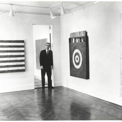 Leo Castelli in a room of the Jasper Johns exhibit at the Castelli Gallery, New York, 1958. Archives of American Art, Smithsonian Institution