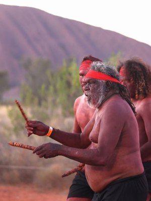 Anangu members perform a dance during a ceremony marking the permanent ban on climbing Uluru on 27 October 2019.