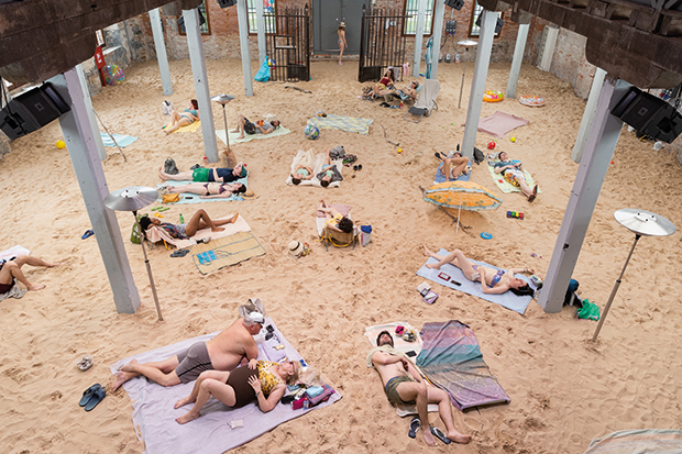 Installation view of <em>Sun & Sea (Marina) </em>by the Lithuanian Pavilion at the Venice Biennale, 2019. Photo: © Andrej Vasilenko / Francesco del Vecchio