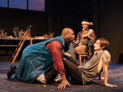 Stefan Adegbola as Poggio di Chiusi, Hiran Abeysekera as Leonardo da Vinci, and Dickie Beau as Sandro Botticelli in Botticelli in the Fire at Hampstead Theatre, London, 2019.