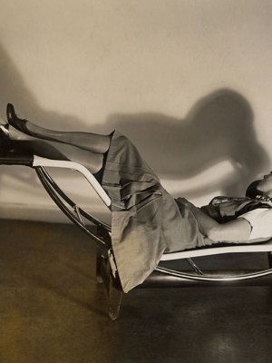 Charlotte Perriand on the ‘chaise longue basculante, B306’ designed by Perriand, Pierre Jeanneret and Le Corbusier in c. 1928.