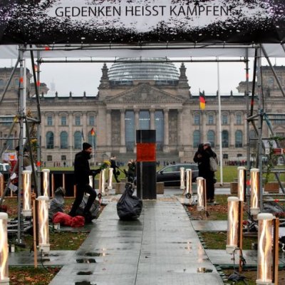 Centre for Political Beauty activists install their work in Berlin in December 2019.