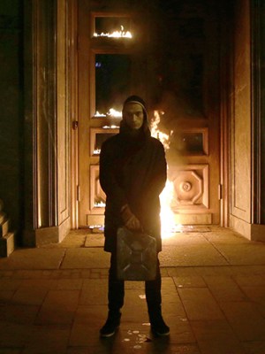 Russian artist Pyotr Pavlensky poses after setting fire to the doors of the headquarters of the FSB security service, the successor to the KGB, in central Moscow early on November 9, 2015. Photo by NIGINA BEROEVA/AFP via Getty Images