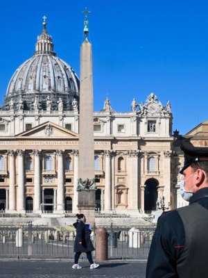 A police officer standing guard in St Peter’s Square.
