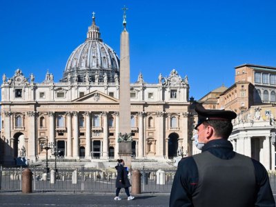 A police officer standing guard in St Peter’s Square.